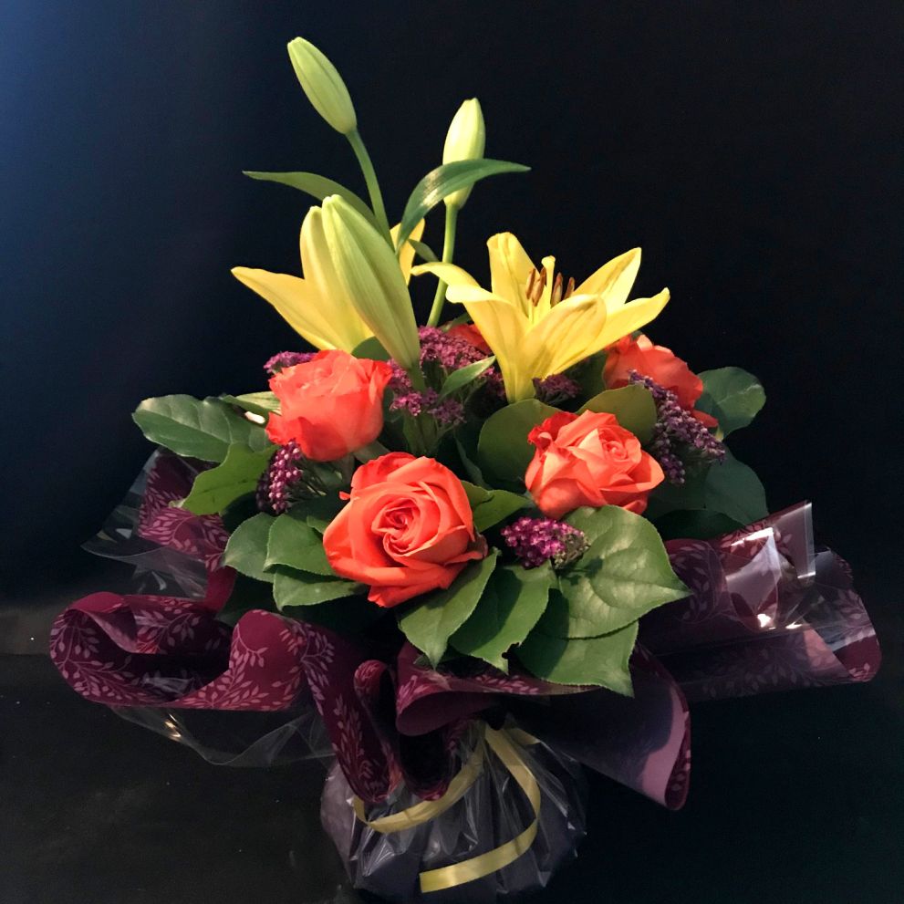 Bouquet con lilium e rose